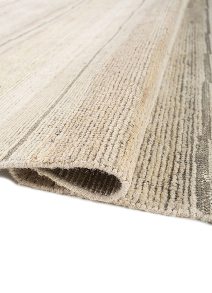manifest ivory afghan wool hand knotted Rug - FoldShot
