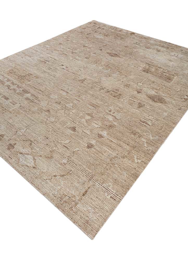 manifest beige and brown afghan wool hand knotted Rug - FoldShot manifest beige and brown afghan wool hand knotted Rug - FoldShot