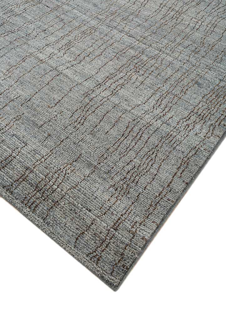 manifest blue afghan wool hand knotted Rug - FoldShot