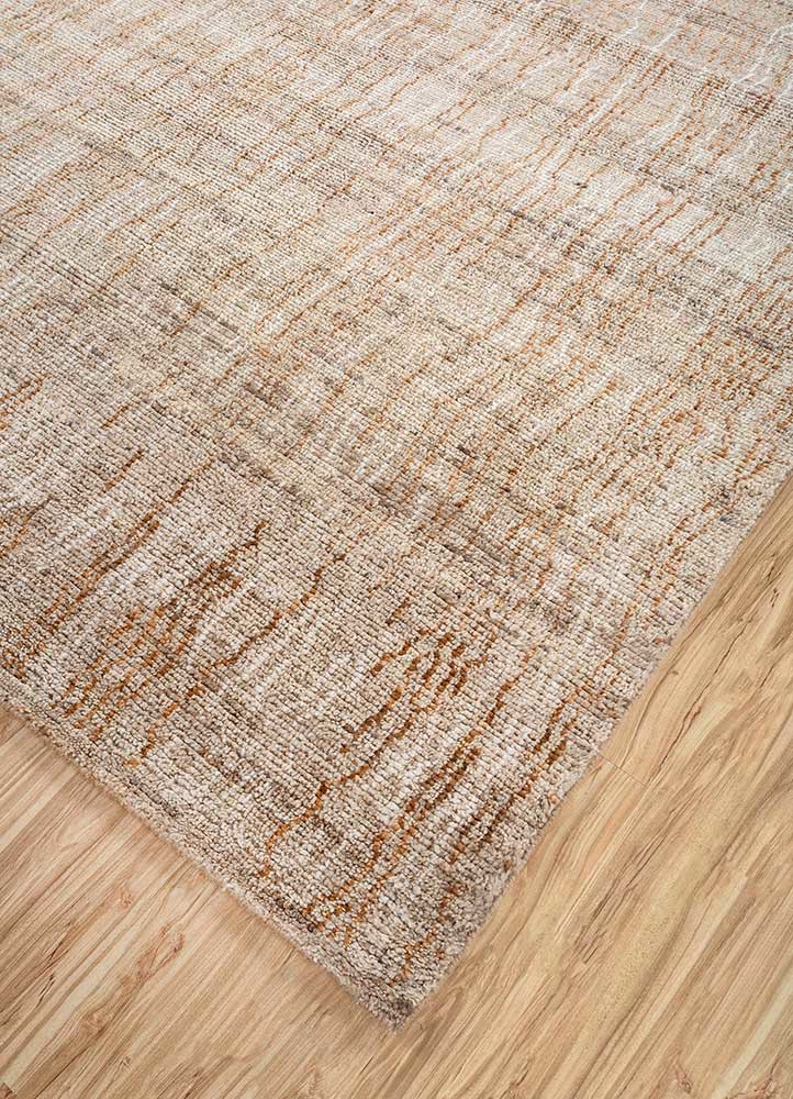 manifest beige and brown afghan wool hand knotted Rug - FoldShot