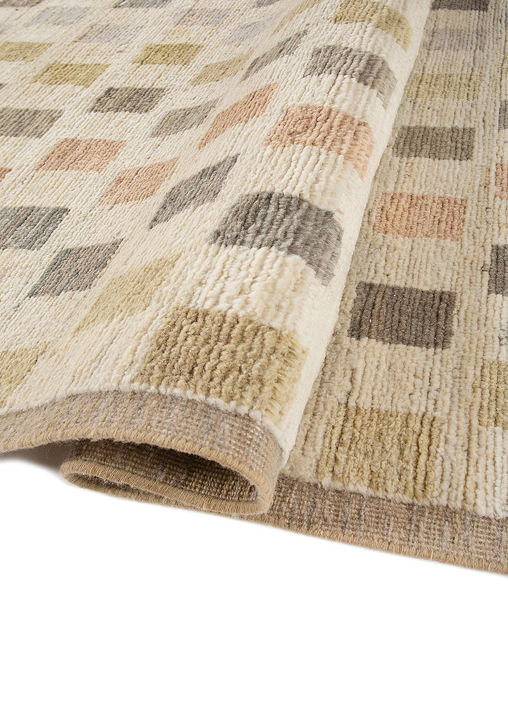manifest ivory afghan wool hand knotted Rug - FoldShot manifest ivory afghan wool hand knotted Rug - FoldShot