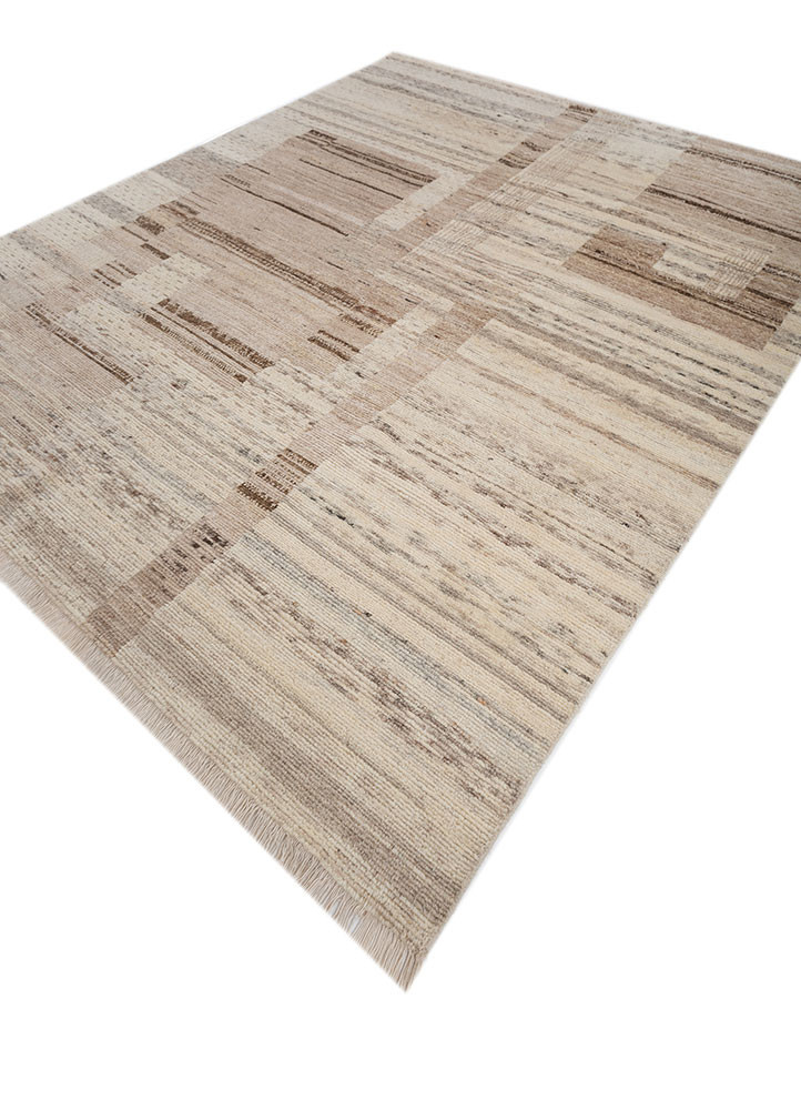 blythe beige and brown afghan wool hand knotted Rug - FoldShot blythe beige and brown afghan wool hand knotted Rug - FoldShot