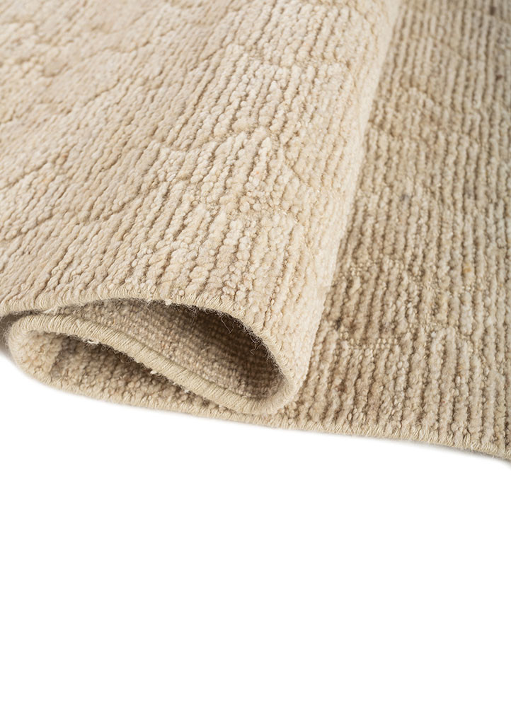 manifest ivory wool hand knotted Rug - FoldShot