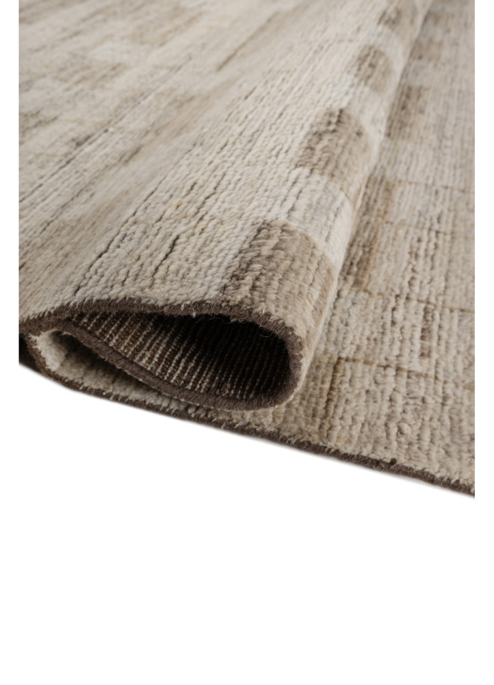 manifest gold wool hand knotted Rug - FoldShot manifest gold wool hand knotted Rug - FoldShot