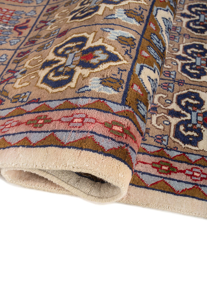 gulnar ivory wool hand knotted Rug - FoldShot