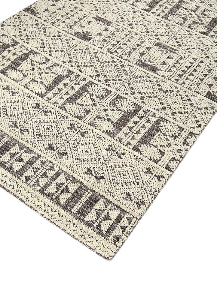manifest ivory wool hand knotted Rug - FoldShot manifest ivory wool hand knotted Rug - FoldShot