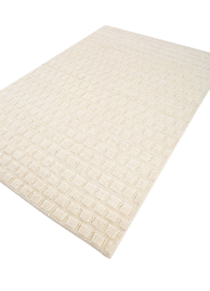 manifest ivory wool hand knotted Rug - FoldShot manifest ivory wool hand knotted Rug - FoldShot