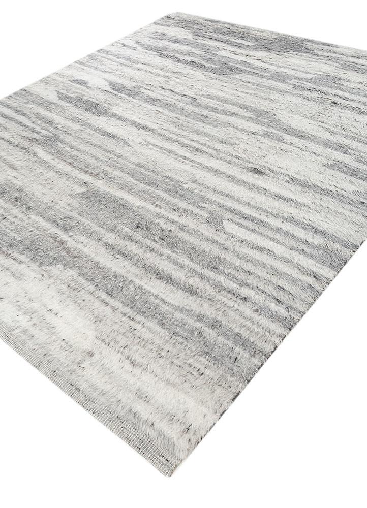 uvenuti ivory wool hand knotted Rug - FoldShot uvenuti ivory wool hand knotted Rug - FoldShot