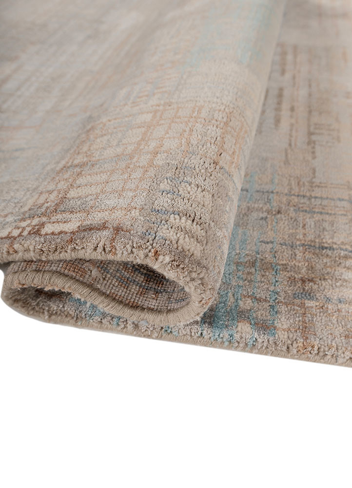 unstring by kavi ivory wool and bamboo silk hand knotted Rug - FoldShot