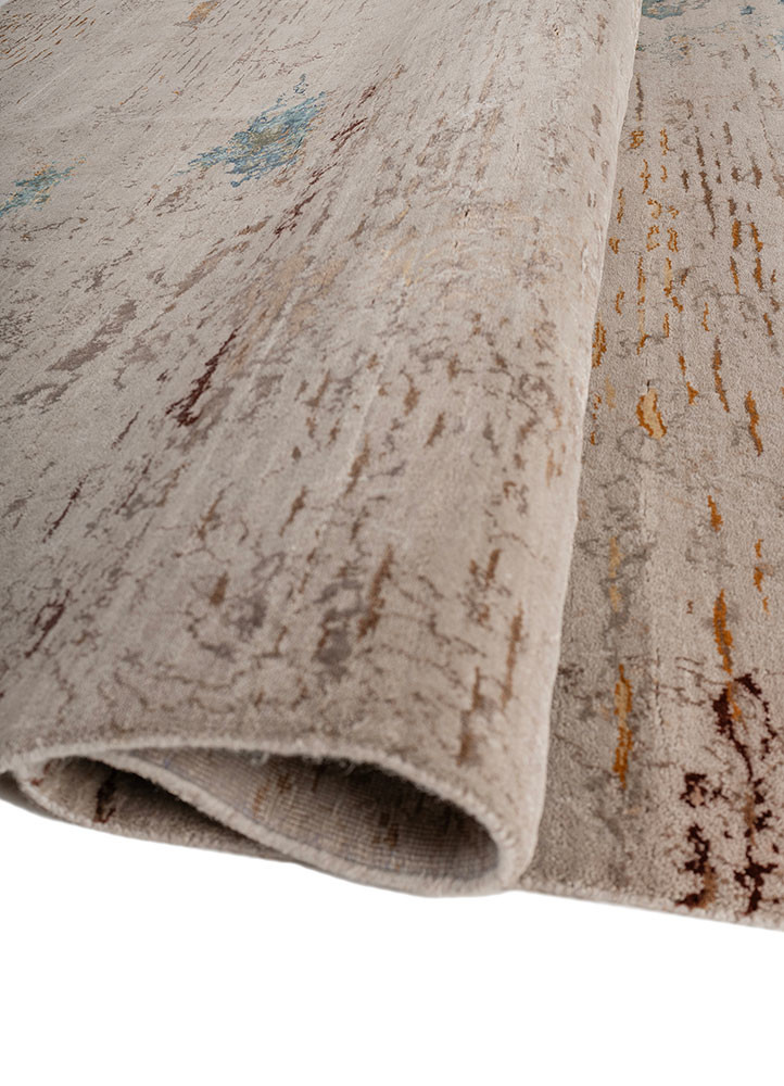 unstring by kavi grey and black wool and bamboo silk hand knotted Rug - FoldShot unstring by kavi grey and black wool and bamboo silk hand knotted Rug - FoldShot