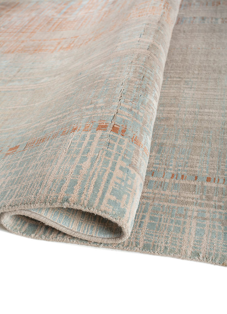 unstring by kavi grey and black wool and bamboo silk hand knotted Rug - FoldShot unstring by kavi grey and black wool and bamboo silk hand knotted Rug - FoldShot