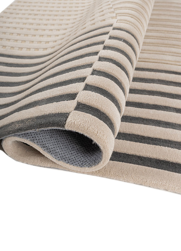 faces blue wool and viscose hand tufted Rug - FoldShot