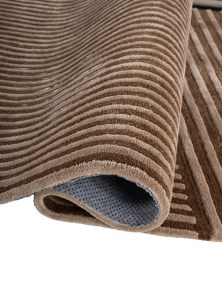 faces beige and brown wool and viscose hand tufted Rug - FoldShot