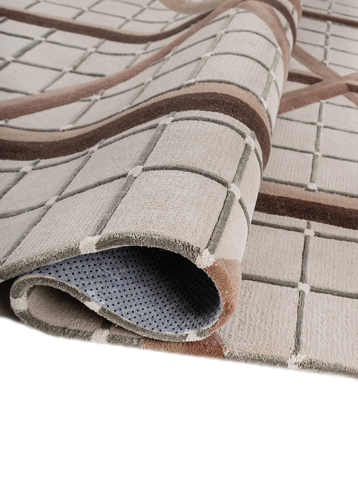 faces ivory wool and viscose hand tufted Rug - FoldShot