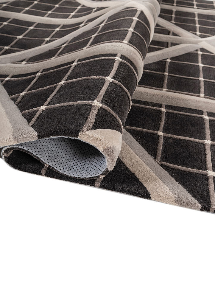 faces blue wool and viscose hand tufted Rug - FoldShot