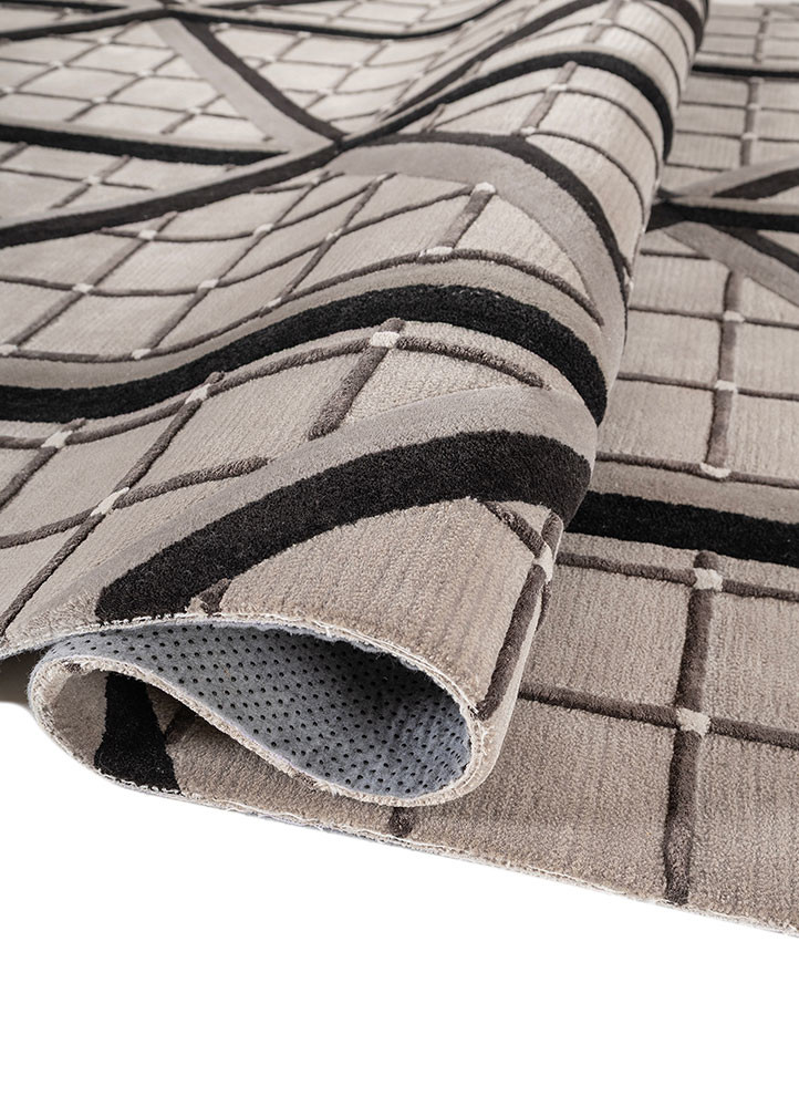 faces beige and brown wool and viscose hand tufted Rug - FoldShot