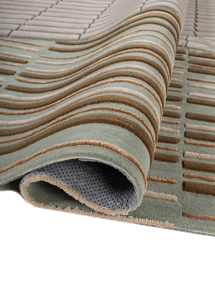 faces blue wool and viscose hand tufted Rug - FoldShot