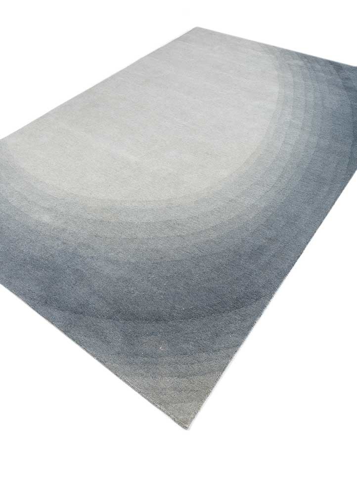 chroma blue wool hand tufted Rug - FoldShot