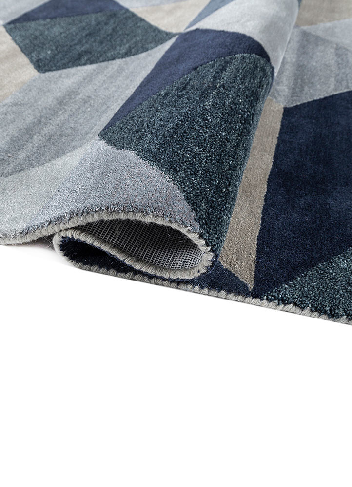 en casa by luli sanchez blue wool hand tufted Rug - FoldShot en casa by luli sanchez blue wool hand tufted Rug - FoldShot