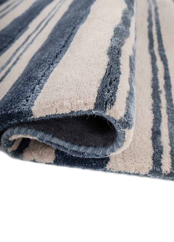 linear blue wool and viscose hand tufted Rug - FoldShot