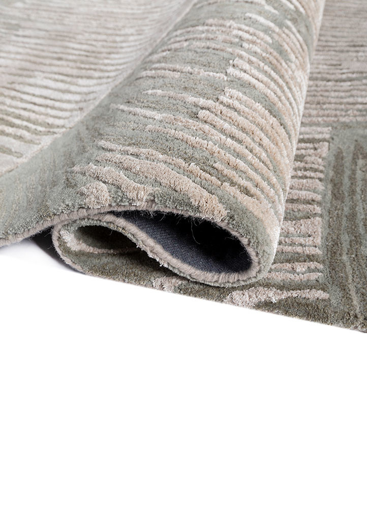 lucid ivory wool and viscose hand tufted Rug - FoldShot lucid ivory wool and viscose hand tufted Rug - FoldShot
