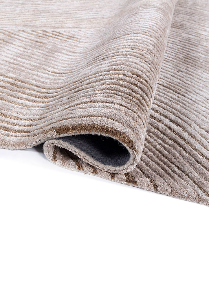 lucid ivory wool and viscose hand tufted Rug - FoldShot lucid ivory wool and viscose hand tufted Rug - FoldShot