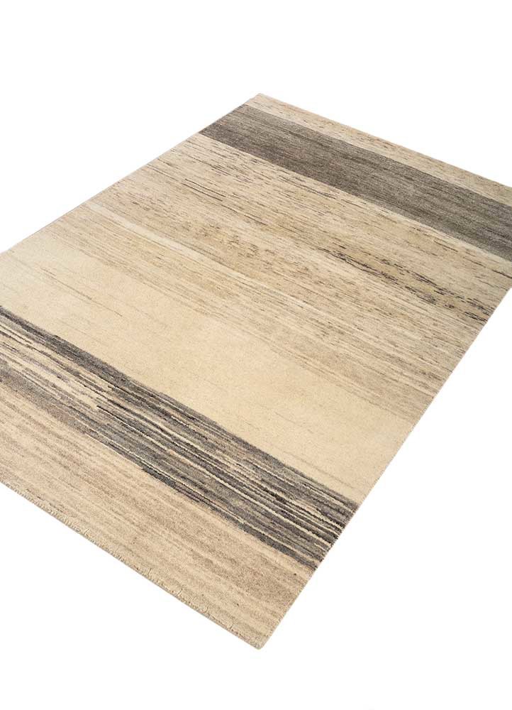 manifest ivory wool hand knotted Rug - FoldShot manifest ivory wool hand knotted Rug - FoldShot