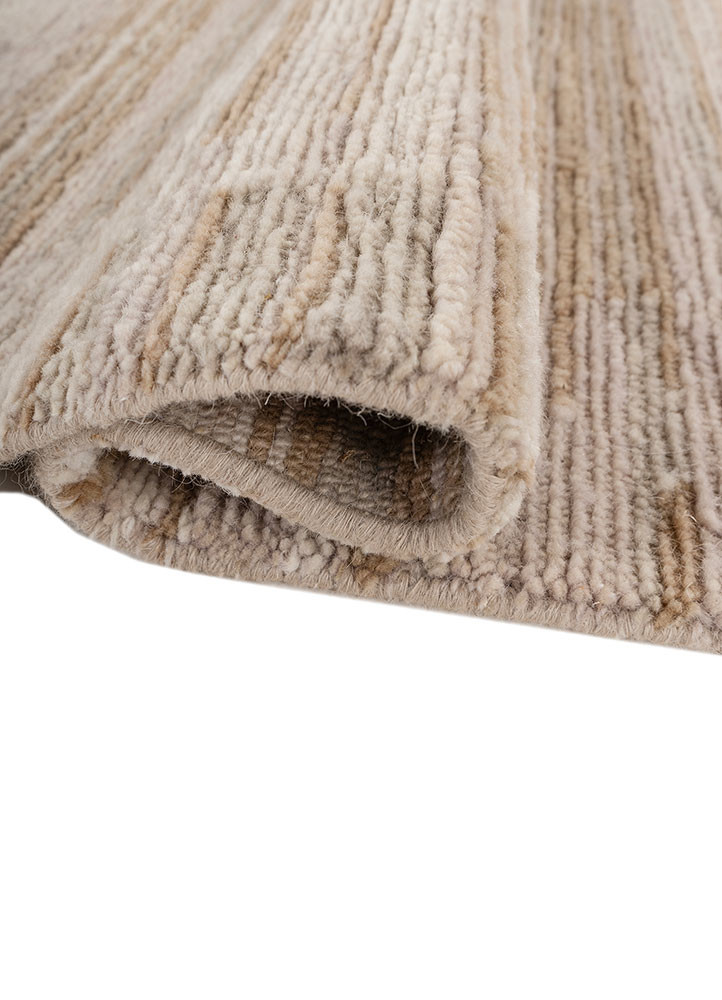 manifest ivory wool hand knotted Rug - FoldShot manifest ivory wool hand knotted Rug - FoldShot