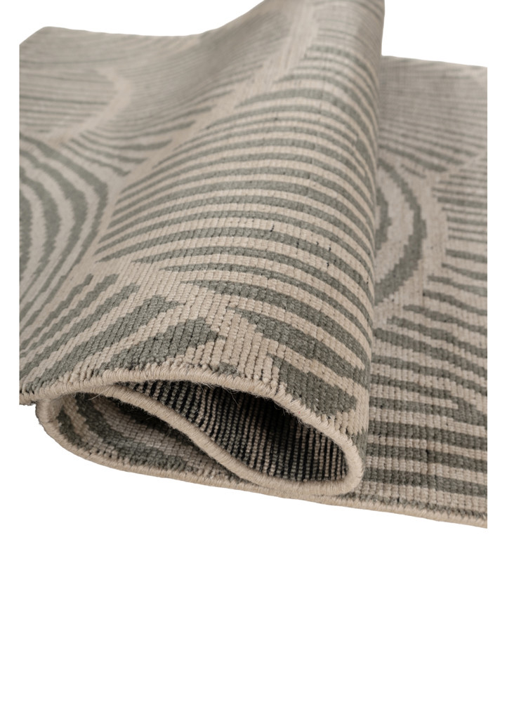 aprezo green wool hand knotted Rug - FoldShot aprezo green wool hand knotted Rug - FoldShot