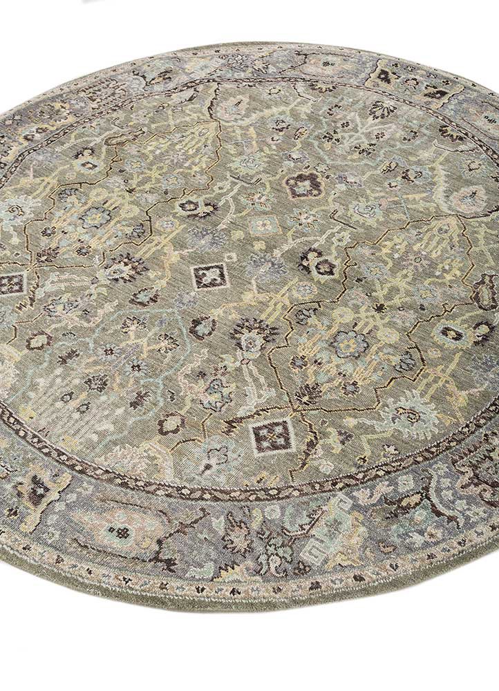 someplace in time green afghan wool hand knotted Rug - FoldShot someplace in time green afghan wool hand knotted Rug - FoldShot