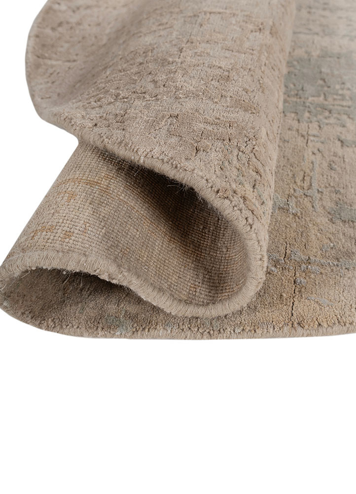 aprezo ivory wool and bamboo silk hand knotted Rug - FoldShot aprezo ivory wool and bamboo silk hand knotted Rug - FoldShot