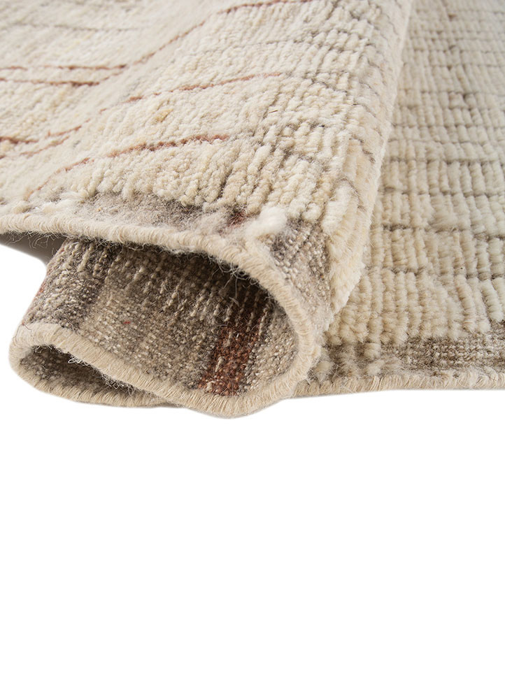 manifest ivory wool hand knotted Rug - FoldShot manifest ivory wool hand knotted Rug - FoldShot