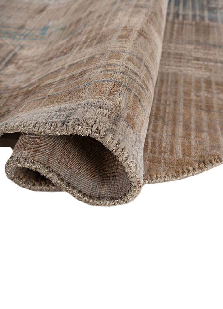 unstring by kavi grey and black wool and bamboo silk hand knotted Rug - FoldShot unstring by kavi grey and black wool and bamboo silk hand knotted Rug - FoldShot