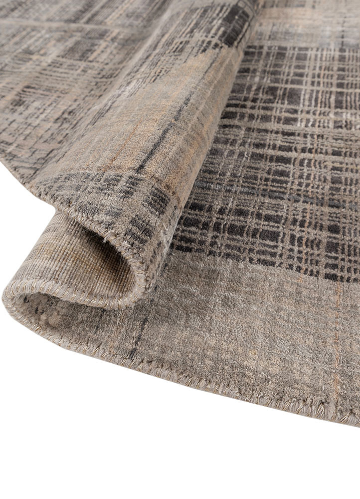unstring by kavi ivory wool and bamboo silk hand knotted Rug - FoldShot
