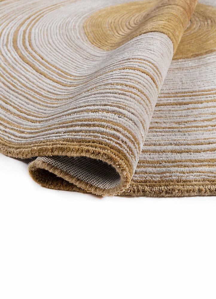 come around gold wool and viscose hand tufted Rug - FoldShot