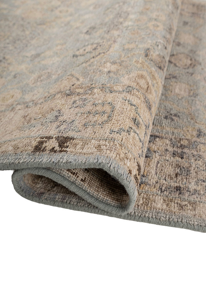 someplace in time blue afghan wool hand knotted Rug - FoldShot someplace in time blue afghan wool hand knotted Rug - FoldShot