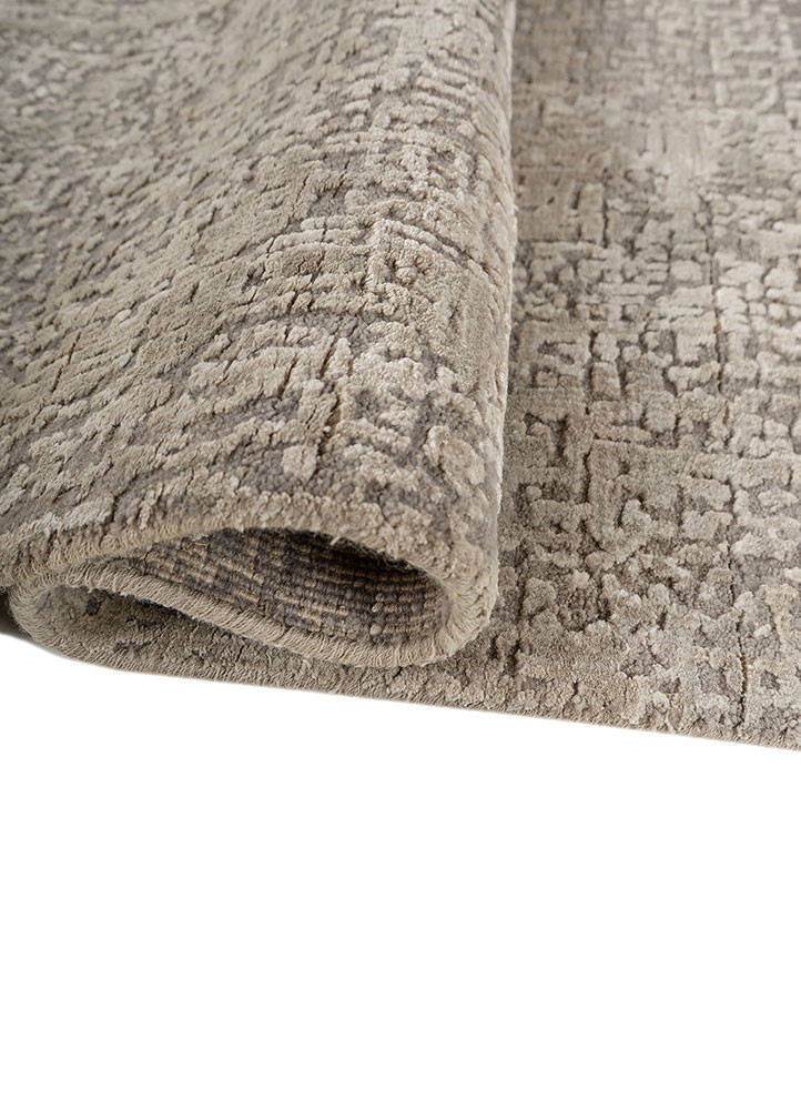 entropy ivory wool and bamboo silk hand knotted Rug - FoldShot entropy ivory wool and bamboo silk hand knotted Rug - FoldShot
