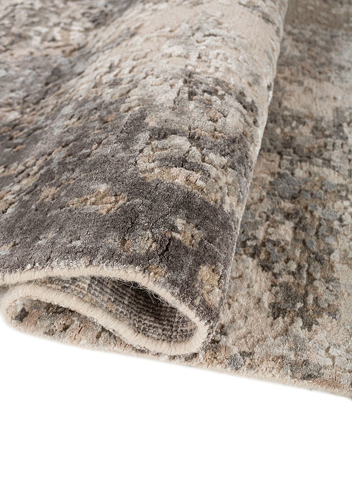 uvenuti ivory wool and bamboo silk hand knotted Rug - FoldShot uvenuti ivory wool and bamboo silk hand knotted Rug - FoldShot