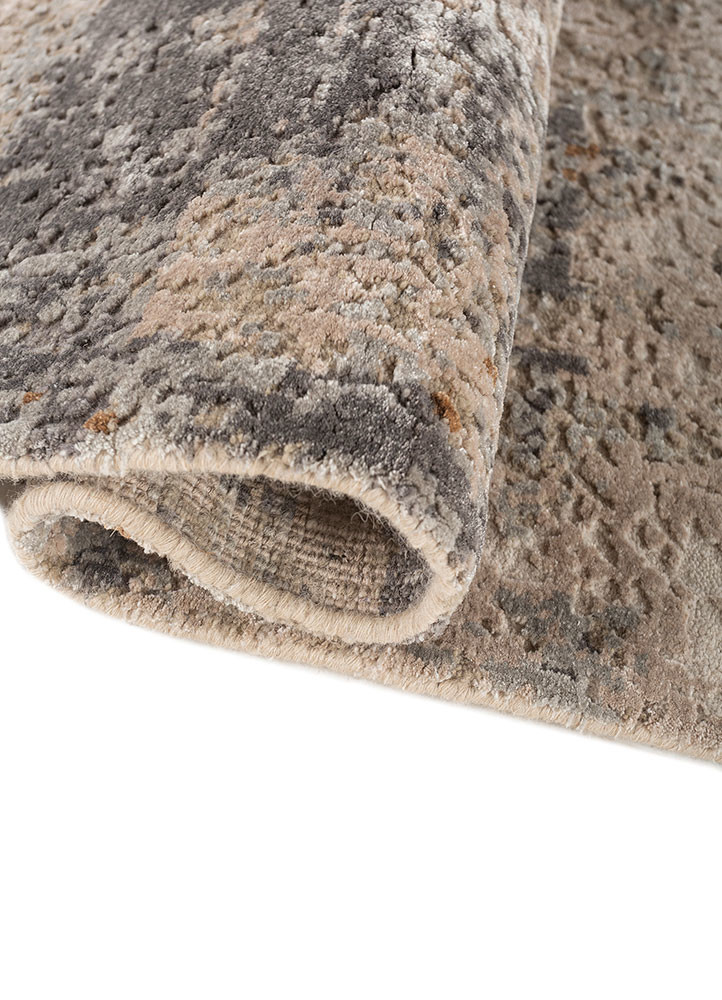 uvenuti ivory wool and bamboo silk hand knotted Rug - FoldShot uvenuti ivory wool and bamboo silk hand knotted Rug - FoldShot