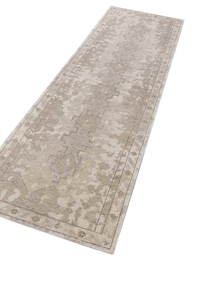 erbe ivory wool hand knotted Rug - FoldShot