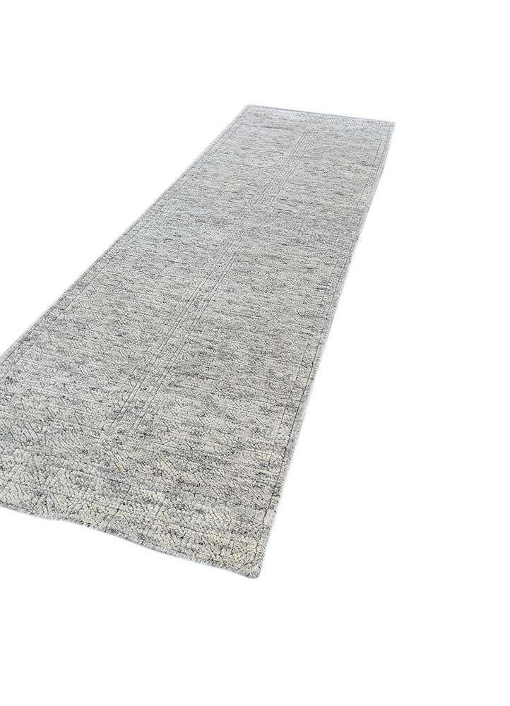 manifest ivory wool hand knotted Rug - FoldShot manifest ivory wool hand knotted Rug - FoldShot