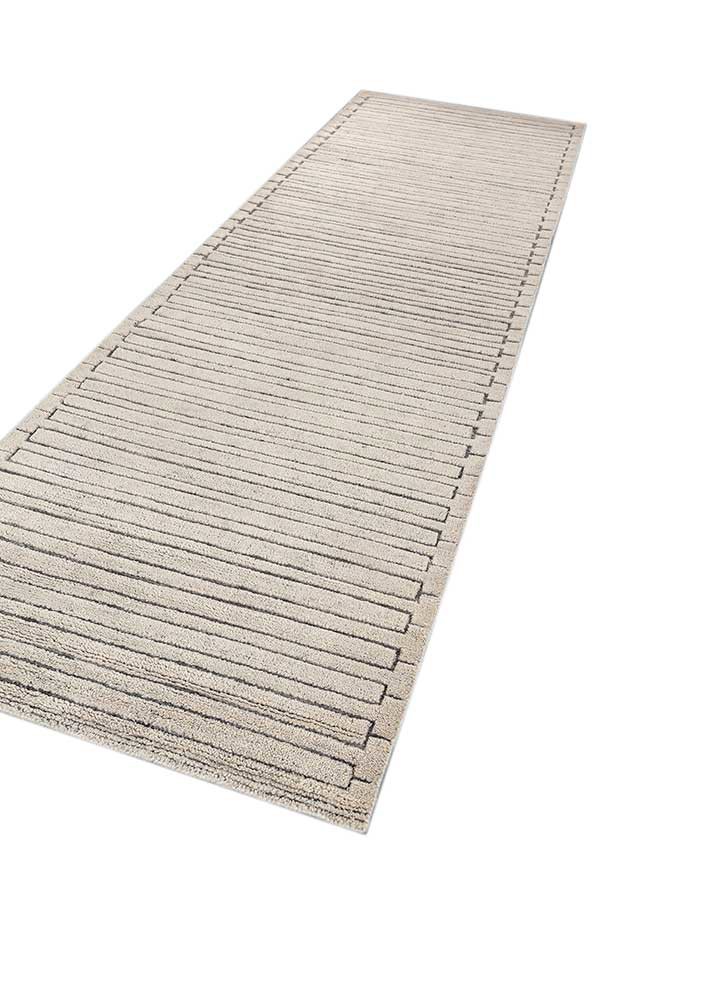 manifest ivory wool hand knotted Rug - FoldShot manifest ivory wool hand knotted Rug - FoldShot