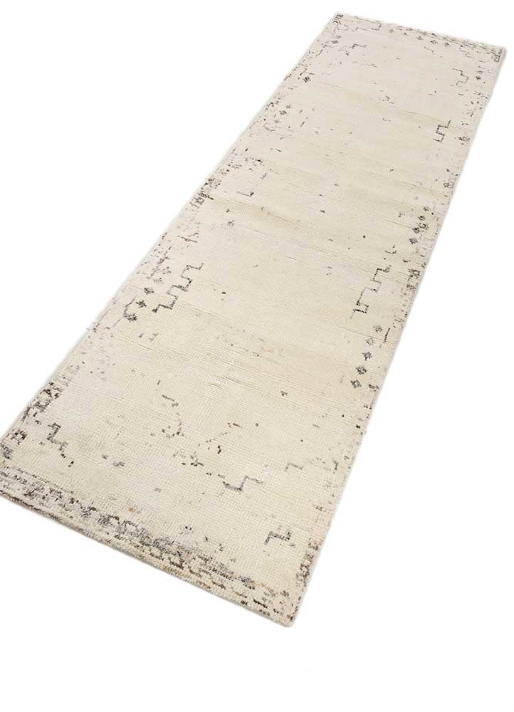 manifest ivory wool hand knotted Rug - FoldShot manifest ivory wool hand knotted Rug - FoldShot