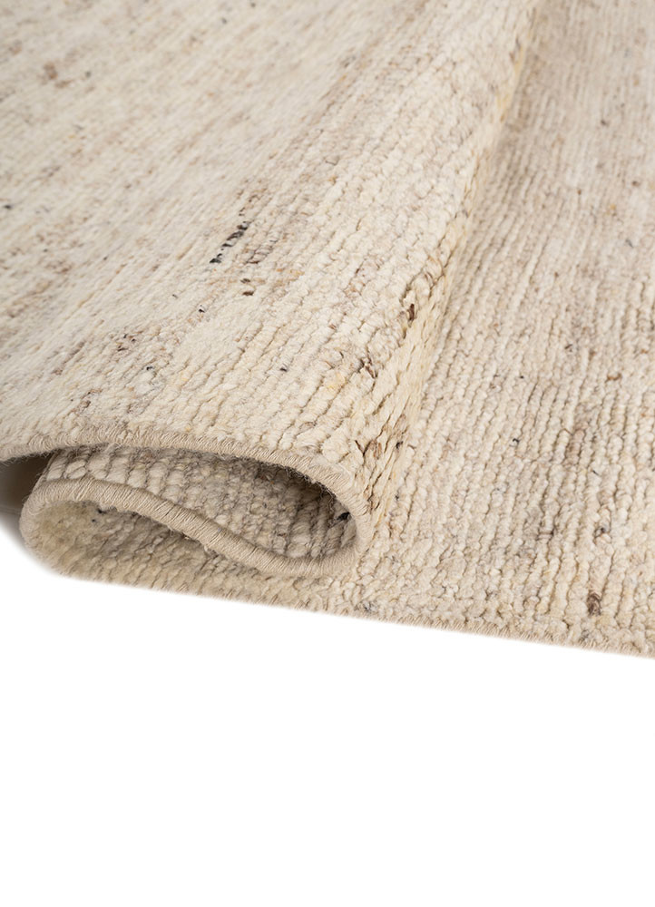 manifest ivory wool hand knotted Rug - FoldShot manifest ivory wool hand knotted Rug - FoldShot