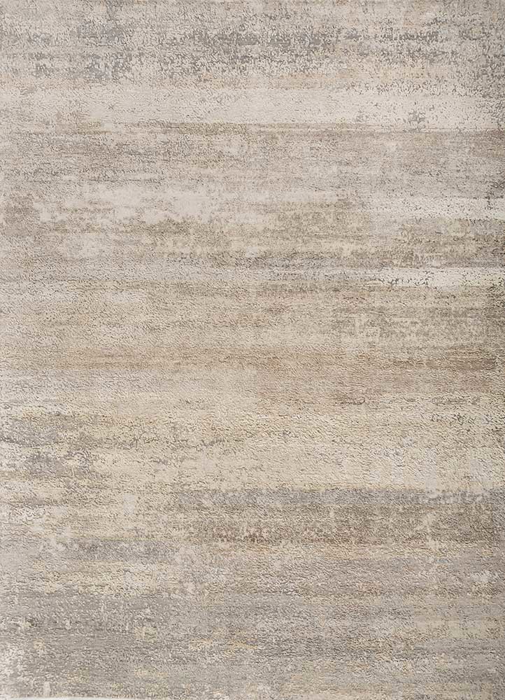  ivory wool and silk hand knotted Rug