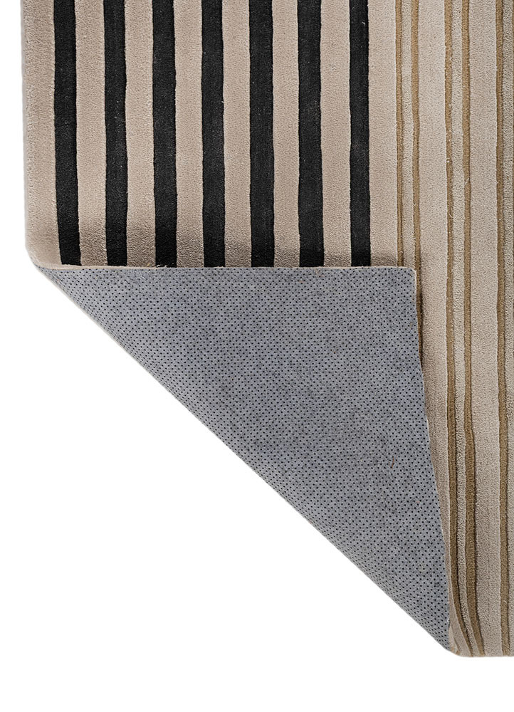 faces blue wool and viscose hand tufted Rug - Backing Shot