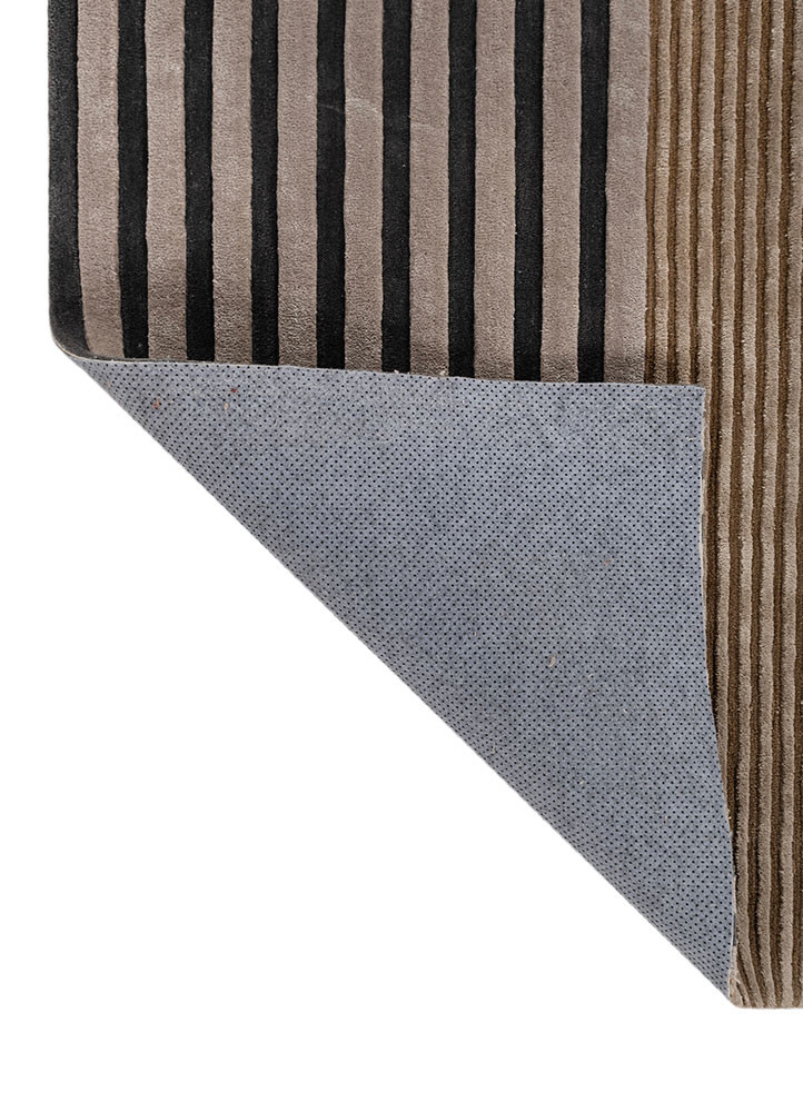 faces grey and black wool and viscose hand tufted Rug - Backing Shot
