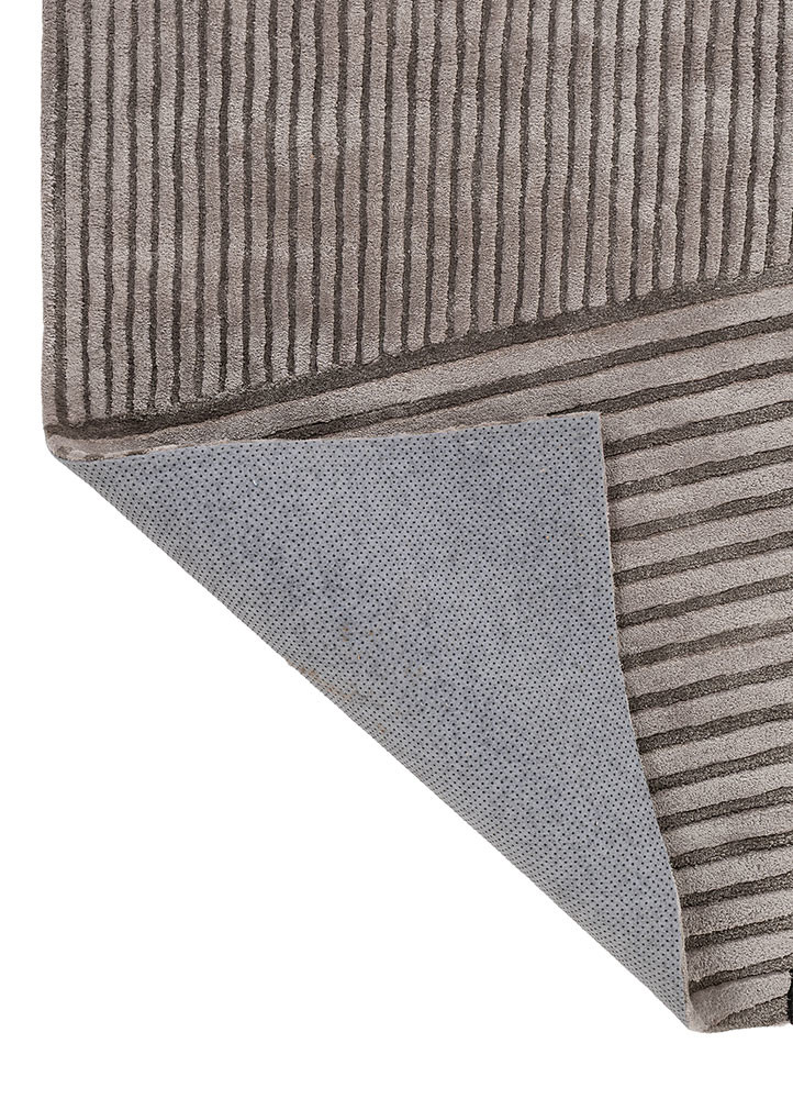 faces grey and black wool and viscose hand tufted Rug - Backing Shot