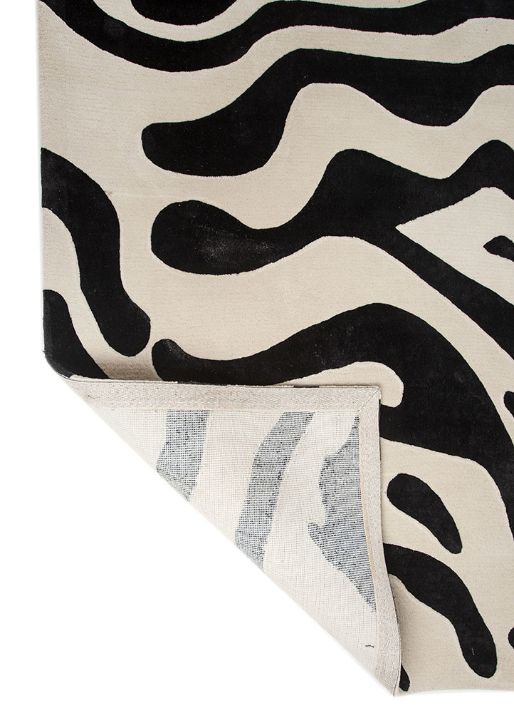 wild wanderlust ivory wool and viscose hand tufted Rug - Backing Shot wild wanderlust ivory wool and viscose hand tufted Rug - Backing Shot