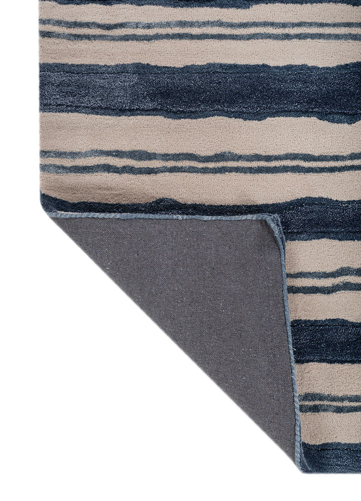linear blue wool and viscose hand tufted Rug - Backing Shot